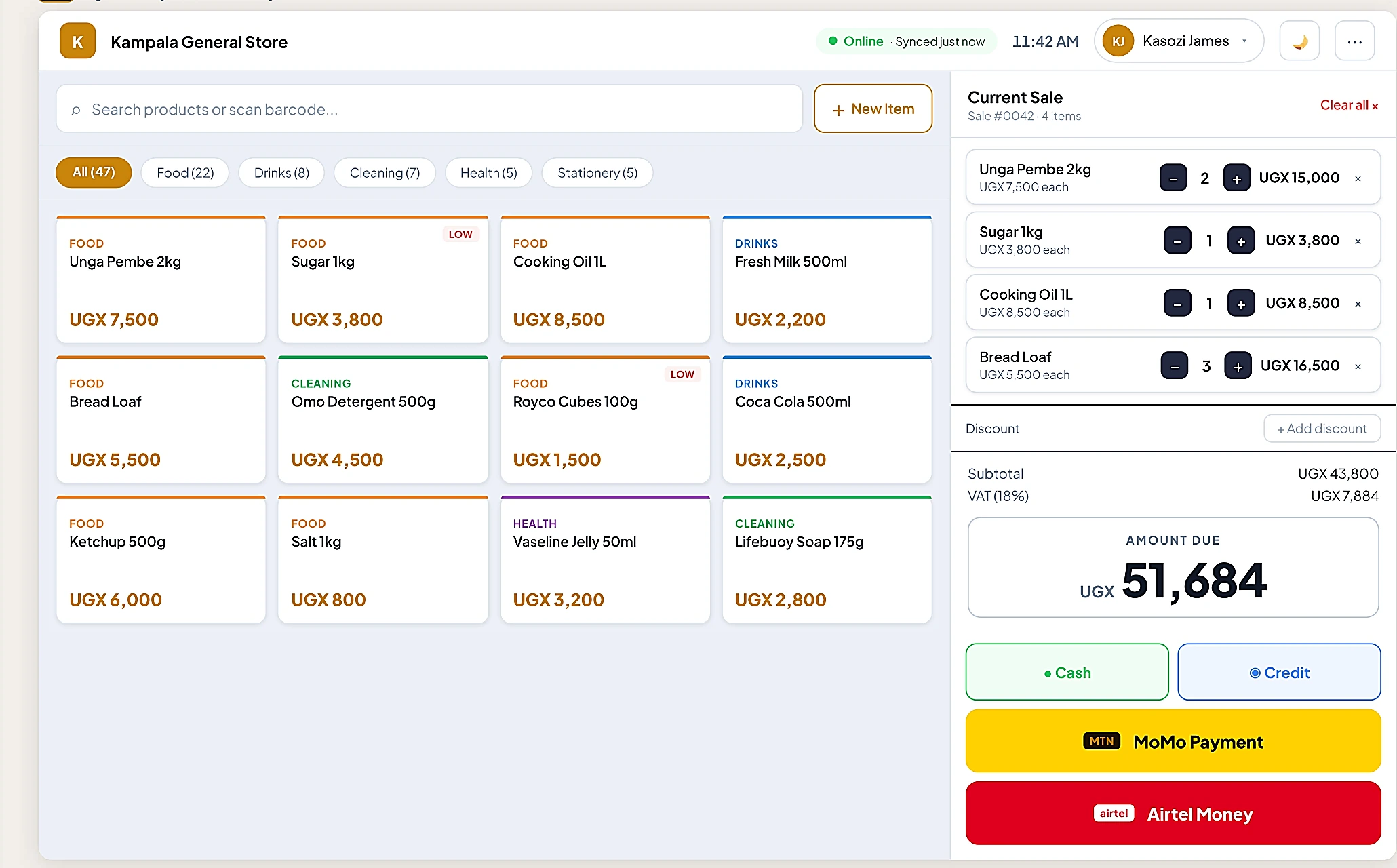 SmarterPOS cashier checkout screen with a grocery cart, UGX totals, and MTN MoMo / Airtel Money payment buttons